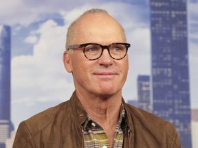 FILE - In this June 25, 2017, file photo, actor Michael Keaton attends the "Spider-Man: Homecoming" cast photo call at The Whitby Hotel in New York. Keaton is slated to give the commencement address on May 12, 2018, at Ohio's Kent State University.