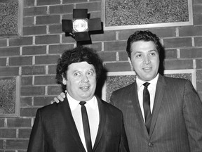 FILE - In this Dec. 10, 1965, file photo, the comedy team of Marty Allen, left, and Steve Rossi, now making their first film on the Paramount lot in Los Angeles. Allen's spokeswoman Candi Cazau says he died Monday, Feb. 12, 2018, of complications from pneumonia. His wife and performing partner Karon Kate Blackwell was by his side. He was 95.
