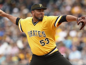 FILE - In this Aug. 6, 2017, file photo, Pittsburgh Pirates relief pitcher Joaquin Benoit throws in the ninth inning against the San Diego Padres during a baseball game in Pittsburgh. Benoit and the Washington Nationals have agreed in principle to a major league contract that will pay the 40-year-old reliever $1 million for the 2018 season, according to a person with knowledge of the deal.