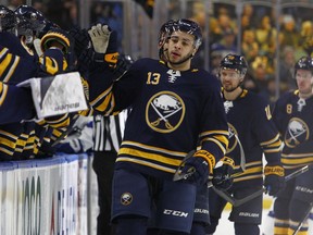Buffalo Sabres forward Nicholas Baptiste (13) celebrates his goal during the first period of an NHL hockey game against the Tampa Bay Lightning, Tuesday, Feb. 13, 2018, in Buffalo, N.Y.