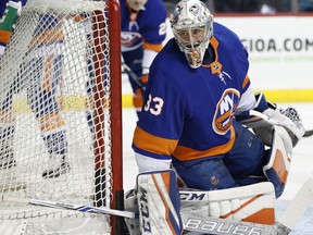 New York Islanders goaltender Christopher Gibson warm up int he net before an NHL hockey game against the Minnesota Wild in New York, Monday, Feb. 19, 2018. Gibson was called up to replace injured Islanders goalie Thomas Greiss.