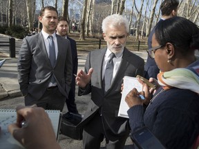Tennis star Eugenie Bouchard's attorney Benedict Morelli speaks to reporters outside Brooklyn Federal court, Wednesday, Feb. 21, 2018, in New York. Bouchard testified during her negligence lawsuit against the United States Tennis Association that a wet floor caused her to slip and fall inside a locker room at the 2015 U.S. Open.