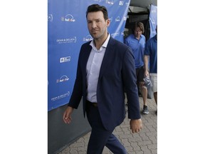 FILE - This May 27, 2017 file photo shows former NFL quarterback Tony Romo leaving the broadcast booth after appearing on air during the third round of the Dean & DeLuca Invitational golf tournament at Colonial Country Club in Fort Worth, Texas. Romo has accepted an exemption to play a PGA Tour event in March in the Dominican Republic.