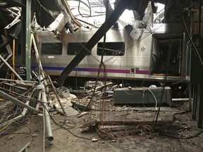 FILE – This Oct. 1, 2016, file photo provided by the National Transportation Safety Board shows damage from a Sept. 29, 2016, commuter train crash that killed a woman and injured more than 100 people at the Hoboken Terminal in Hoboken, N.J. The National Transportation Safety Board is meeting Tuesday, Feb. 6, 2018 and plans to release the probable causes of the Hoboken Terminal crash and the January 2017 crash of a Long Island Rail Road train in Brooklyn.