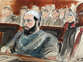 In this courtroom drawing, defendant Ahmad Khan Rahimi is seated during his sentencing hearing in New York, Tuesday, Feb. 13, 2018. Rahimi was sentenced to multiple terms of life in prison for setting off small bombs in two states, including a pressure cooker device that blasted shrapnel across a New York City block. At right is attorney Xavier Donaldson, Rahmin's attorney.