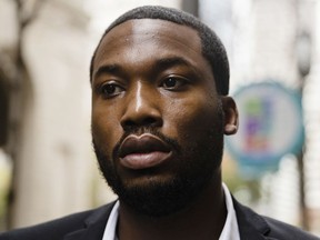 File-This Nov. 6, 2017, file photo shows Rapper Meek Mill arriving at the criminal justice center in Philadelphia.  A Philadelphia judge who has become a target after sentencing Meek Mill to prison on a probation violation has hired her own lawyer who's threatening to sue for defamation. Attorney A. Charles Peruto Jr. said Thursday, Feb. 1, 2018,  that Judge Genece Brinkley hired him last week. He says Mill's legal team has been making baseless claims to the media about the judge's personal and professional conduct.