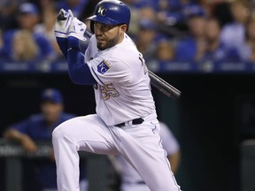 FILE - In a Friday, Sept. 29, 2017 file photo, Kansas City Royals' Eric Hosmer hits an RBI-single in the first inning of a baseball game against the Arizona Diamondbacks at Kauffman Stadium in Kansas City, Mo. A person with direct knowledge of the deal said Sunday, Feb. 18, 2018 that free agent first baseman Hosmer has reached preliminary agreement on an eight-year contract with the San Diego Padres, pending a physical.