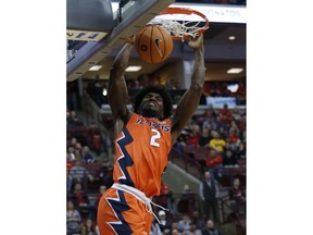 Illinois' Kipper Nichols dunks against Ohio State's during the first half of an NCAA college basketball game Sunday, Feb. 4, 2018, in Columbus, Ohio.