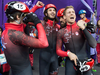 Canada’s Charle Cournoyer, Samuel Girard, Charles Hamelin and Pascal Dion, left to right, react after qualifying in the men’s 5000-metre short-track speedskating relay.