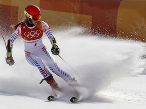 Mikaela Shiffrin, of the United States, skies into the finish area after winning the gold medal in the Women's Giant Slalom at the 2018 Winter Olympics in Pyeongchang, South Korea, Thursday, Feb. 15, 2018.