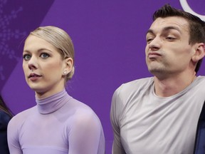 Alexa Scimeca Knierim and Chris Knierim of the USA react as their scores are posted following their performance in the pairs free skate figure skating final in the Gangneung Ice Arena at the 2018 Winter Olympics in Gangneung, South Korea, Thursday, Feb. 15, 2018.