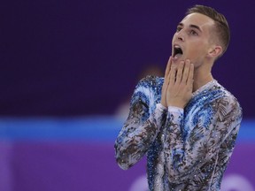 Adam Rippon of the United States reacts after his performance in the men's single skating free skating in the Gangneung Ice Arena at the 2018 Winter Olympics in Gangneung, South Korea, Monday, Feb. 12, 2018.