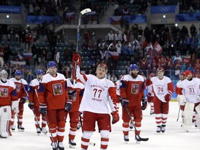 Russian athlete Kirill Kaprizov (77) celebrates after the semifinal round of the men's hockey game against the Czech Republic at the 2018 Winter Olympics in Gangneung, South Korea, Friday, Feb. 23, 2018. Olympic Athletes from Russia won 3-0.