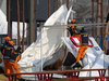 Emergency workers on the scene at Olympic Park. High winds wreaked havoc at the Olympics – some events are being postponed.