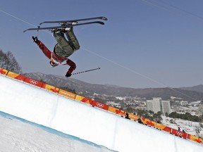 Cassie Sharpe, of Canada, jumps during women's halfpipe final at Phoenix Snow Park at the 2018 Winter Olympics in Pyeongchang, South Korea, Tuesday, Feb. 20, 2018.