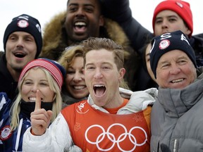 Shaun White, of the United States, celebrates winning gold after the men's halfpipe finals at Phoenix Snow Park at the 2018 Winter Olympics in Pyeongchang, South Korea, Wednesday, Feb. 14, 2018.