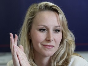 FILE - In this April 11, 2017 file photo, then far-right National Front party regional leader for southeastern France Marion Marechal-Le Pen attends a press conference in Bayonne, southwestern France. Out of the shadows, the woman who was the rising star of France's far right National Front until she left politics is emerging on the other side of the Atlantic, stepping into the limelight as a speaker at a major forum for American conservatives.