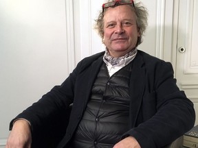 Frederic Durand-Baissas, a 59-year-old Parisian teacher and art lover, poses during an interview in Paris, Thursday, Feb. 1, 2018.  Durand-Baissas, whose Facebook account was suspended in 2011 after he posted a photo of Gustave Courbet's 1866 painting "The Origin of the World," which depicts female genitalia, is suing the California-based social network Facebook for alleged "censorship".