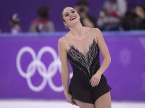Canada's Kaetlyn Osmond reacts at the end of her performance in the women's figure skating free program at the Pyeongchang Winter Olympics Friday, February 23, 2018 in Gangneung, South Korea.