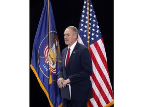 FILE - In this Dec. 4, 2017, file photo, Interior Secretary Ryan Zinke takes the stage before President Donald Trump speaks at the Utah State Capitol in Salt Lake City. On Friday, Feb. 23, 2018, Zinke will announce he will revise proposed new regional boundaries for the Interior Department as part of a major reorganization of the agency. The new boundaries would more closely follow state lines, a change from his earlier proposal, which largely ignored state boundaries and relied mostly on rivers and other natural features.