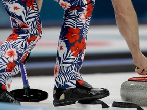 Norwegian skip Thomas Ulsrud curls against Canada at the Pyeongchang Olympics on Feb. 15.