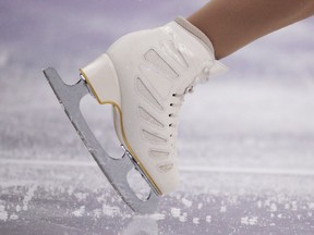 Canadian champion Gabrielle Daleman digs her toe pick into the ice during her free skate in team event at the 2018 Winter Olympics.