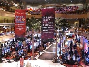 This Jan. 31, 2018 photo shows part of the casino floor at the Tropicana in Atlantic City N.J. Having lost its casino license a decade ago after former owners made drastic cuts that left it filthy, understaffed and losing customers, the Tropicana under the ownership of billionaire investor Carl Icahn has become the No. 2 casino in Atlantic City in terms of overall gambling revenue, trailing only the Borgata.