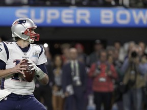 New England Patriots quarterback Tom Brady looks to pass during the second half of the NFL Super Bowl 52 football game against the Philadelphia Eagles, Sunday, Feb. 4, 2018, in Minneapolis.