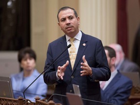 FILE - In this Jan. 3, 2018, file photo, California state Sen. Tony Mendoza, D-Artesia, announces that he will take a month-long leave of absence while an investigation into sexual misconduct allegations against him are completed in Sacramento, Calif. When lawmakers return from the President's Day weekend, Tuesday, Feb. 22, 2018, they will learn whether the investigation cleared Mendoza or sets him up for possible expulsion.