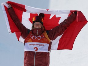 Cassie Sharpe celebrates her gold medal in the ladies ski halfpipe final at the Phoenix Snow Park.