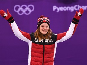 Short track speed skater Kim Boutin celebrates her bronze medal in the women's 500 metres at the Pyeongchang Olympics on Feb. 13.