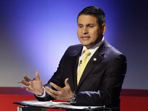 Presidential candidate Fabricio Alvarado with the National Restoration party, speaks during a live, televised debate ahead of the presidential election, in San Jose, Costa Rica, Thursday, Feb. 1, 2018. Alvarado, a 43-year-old journalist with a prominent career as a preacher and Christian singer, has vaulted to leading contender in Sunday's vote in a survey published Jan. 31 by the University of Costa Rica and the Opol consulting firm.