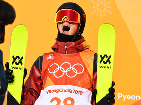 Alex Beaulieu-Marchand of Canada reacts to his score following his second run in the men's skiing slopestyle final.