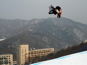 Max Parrot of Canada during his first qualification run in the snowboard men's slopestyle event.