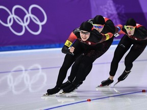 From front to back, Canada's Josie Morrison, Isabelle Weidemann and Ivanie Blondin compete in the women's team pursuit B final on Feb. 21.