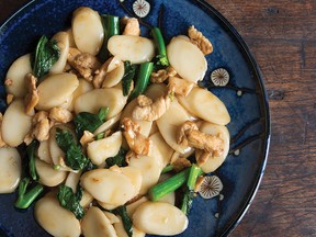 Stir-fried rice cake with chicken and Chinese broccoli