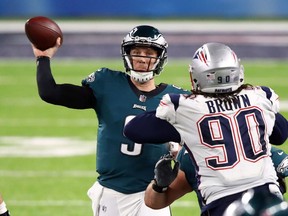 Philadelphia Eagles quarterback Nick Foles passes against the New England Patriots in Super Bowl LII on Feb. 4.