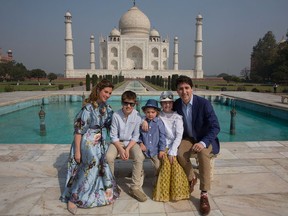 Prime Minister Justin Trudeau, his wife, Sophie Grégoire Trudeau, and children Xavier, Hadrien and Ella-Grace pose in front of  the Taj Mahal in Agra, India, on Feb. 18, 2018.