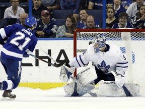 Tampa Bay Lightning Brayden Point fires what proves to be the game-winning goal in a shootout past Toronto Maple Leafs' goaltender Frederik Andersen during NHL action Monday in Tampa. The Lightning were 4-3 winners.
