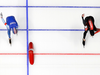 Ted-Jan Bloemen of Canada, right, crosses the finish line a fraction of a second before Norway’s Sverre Lunde Pedersen during the men’s 5,000 meters race at the Gangneung Oval at the 2018 Winter Olympics.