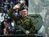 Former Toronto Maple Leaf Dave ‘Tiger’ Williams salutes the crowd on military honour night before a game in Toronto on March 16, 2013.