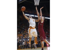 Tennessee forward Grant Williams (2) goes up for a shot beside South Carolina forward Jason Cudd during the first half of an NCAA college basketball game Tuesday, Feb. 13, 2018, in Knoxville, Tenn.