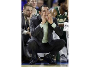 UAB coach Robert Ehsan yells to his players during the first half of an NCAA college basketball game against Middle Tennessee on Saturday, Feb. 24, 2018, in Murfreesboro, Tenn.