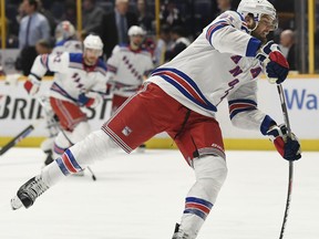 New York Rangers right wing Rick Nash (61) warms up before an NHL hockey game against the Nashville Predators, Saturday, Feb. 3, 2018, in Nashville, Tenn.