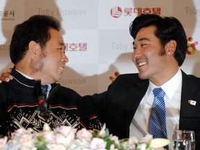 Toby Dawson and his biological father Kim Jae-Su are reunited in Seoul on Feb. 28, 2007