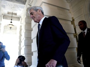 In this June 21, 2017, file photo, former FBI Director Robert Mueller, the special counsel probing Russian interference in the 2016 election, departs Capitol Hill following a closed door meeting in Washington.