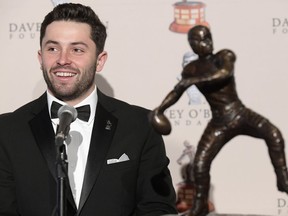 The Davey O'Brien National Quarterback Award winner Baker Mayfield attends a news conference at the Fort Worth Club in Fort Worth, Texas, Monday, Feb. 19, 2018.