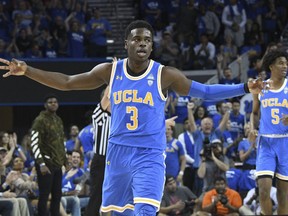 UCLA guard Aaron Holiday (3) gestures after making a three-point shot during the first half of an NCAA college basketball game against Southern California, Saturday, Feb. 3, 2018, in Los Angeles.