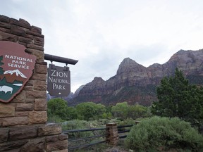 This Sept. 15, 2015, file photo, shows Zion National Park near Springdale, Utah. Zion National Park officials say a 13-year-old girl has fallen to her death from a popular narrow trail bordered by steep drops.