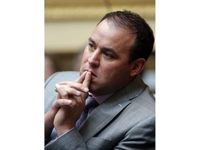 This Jan. 22, 2018, photo shows  Republican state Rep. Mike Schultz, of Hooper, on the house floor at the Utah State Capitol in Salt Lake City. Schultz, a Utah lawmaker has sponsored a bill that would void an education initiative if it passes because he says the initiative's goals could be reached without sales and income tax hikes.